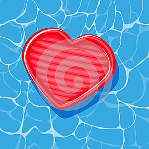 Pool infantable red heart leaf mattress place on water texture.