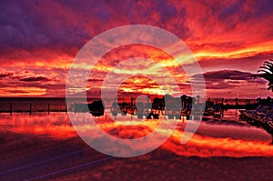 pool resort sunset golden hour