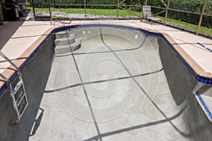 Pool resurfacing and gray cement bond coat