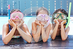 Pool, smile and portrait of children with goggles for swimming lesson, activity or hobby fun. Happy, snorkeling and girl