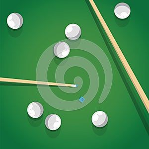 Pool stick and balls on green billiard table while game. Biliard balls and cue for pool game on green table top view.