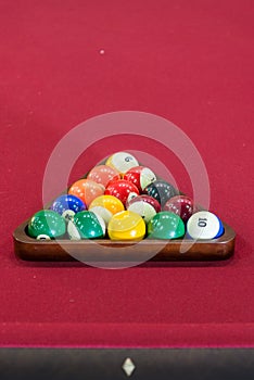 Pool Table / Balls Racked Up on Red photo