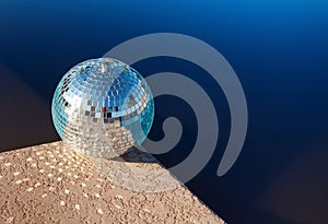 Pool time day club party vibes - disco ball on edge of pool