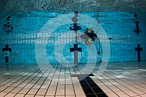 Pool underwater with scuba gear