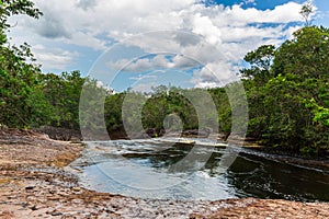 Pool of water at Cachoeira da Iracema waterfalls in the Amazon River at Presidente Figeuiredo, Brazil, South America