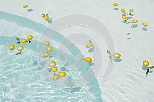 Pool Water With Citrus. Pure Aqua Surface With Glares Pattern And Floating Fresh Lemons.