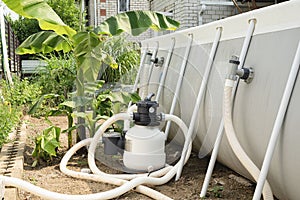 Sand filter plant at a pool in the backyard