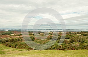 Poole harbour and the Dorset countryside on a summer`s day in the English countryside.