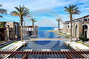 The pools and beach at luxury hotel