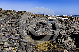 The Pools of water in the volcanic rock