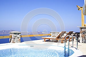 Poolside in a Resort at Imerovigli, Santorini island photo