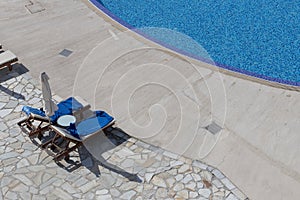 Poolside Loungeing Area, sun loungers and swimming pool