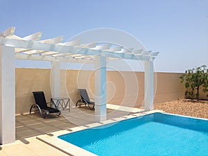 Poolside pergola, gazebo providing shade