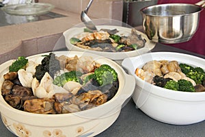 Poon Choi Cantonese Big Feast Bowls Preparation photo