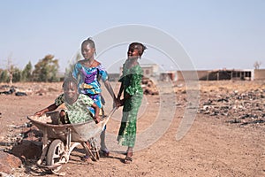 Poor Aboriginal Youngster with Natural Water for an aridity concept