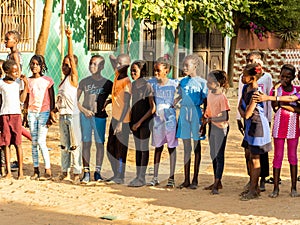 Poor african senegalese children playing outdoor