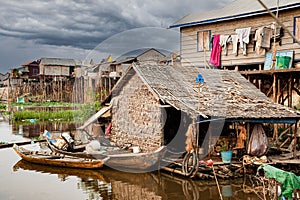 Poor Cambodians living in poverty along a river