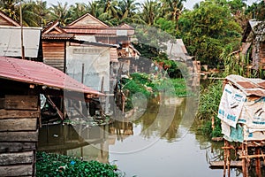 Poor Cambodians living in poverty along a river