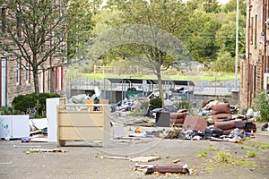 Poor council flats with fly tipping of rubbish outdoors Inverclyde Scotland