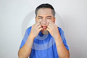 Poor Eyesight. Young Man Can't See, Having Problems With Vision, Looking At Camera. Ophthalmic Issue.