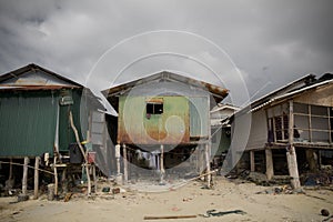 Poor fishers houses along sea coast