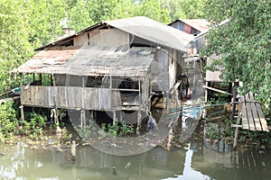 Poor house above river