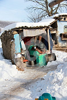 Poor house in winter photo