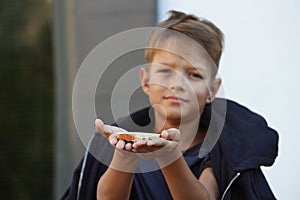 Poor little boy with bread