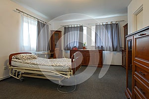 Poor looking private room of long-term care facility