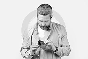 poor man with wallet at hand, povetry. photo of poor man with wallet. poor man with wallet