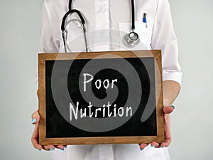 Poor Nutrition Malnutrition sign on the piece of paper