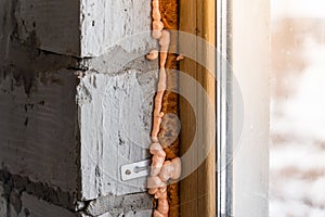Poor quality foam. The reaction of building foam with the atmosphere. Old and new mounting foam photo