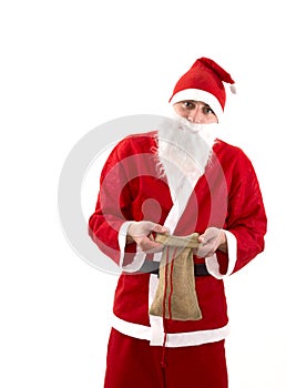 Poor Santa Claus with empty bag in studio