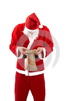 Poor Santa Claus with empty bag in studio