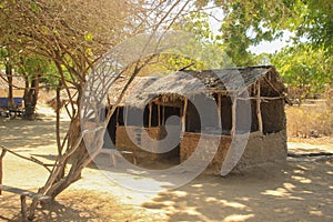 A poor village hut made of wood and clay. The traditional African home of the poor