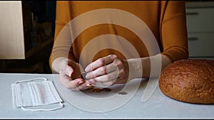 The poor woman is counting the last coins. The economic crisis. Social problem.