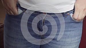 Poor Woman Jeans Showing Empty Pockets. Close Up