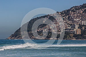 Poorest quarters of the city are favelas on a hill near Ipanema Beach. Brazil, Rio is Janeiro. Poor dwellings in Latin America