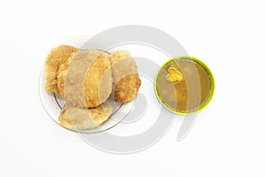 poori or puri with spicy Chole Bhature isolated on white baackground photo