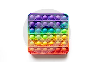 Pop It anti-stress Fidget toy, colorful rainbow game isolated white background