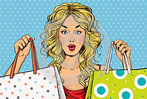 Pop Art blond women with shopping bags in the hands.Shopping Time.