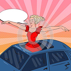 Pop Art Blonde Woman Standing in a Car Sunroof with Arms Wide Open photo