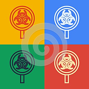 Pop art line Biohazard and magnifying glass icon isolated on color background. Vector