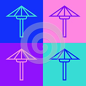 Pop art line Traditional Japanese umbrella from the sun icon isolated on color background. Vector