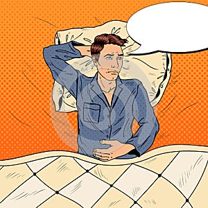 Pop Art Man in Bed Suffering Insomnia and Sleeplessness