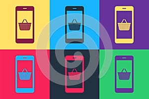 Pop art Mobile phone and shopping basket icon isolated on color background. Online buying symbol. Supermarket basket