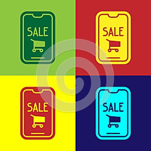 Pop art Mobile phone and shopping cart icon isolated on color background. Online buying symbol. Supermarket basket