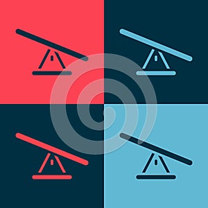 Pop art Seesaw icon isolated on color background. Teeter equal board. Playground symbol. Vector