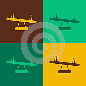 Pop art Seesaw icon isolated on color background. Teeter equal board. Playground symbol. Vector