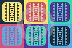 Pop art Tire track icon isolated on color background. Vector